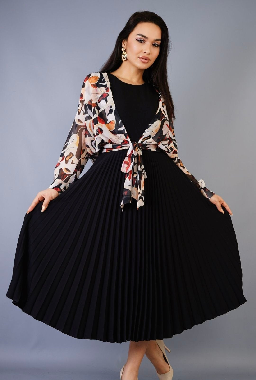 Elegante jurk met chiffon blouse en geplisseerde ro