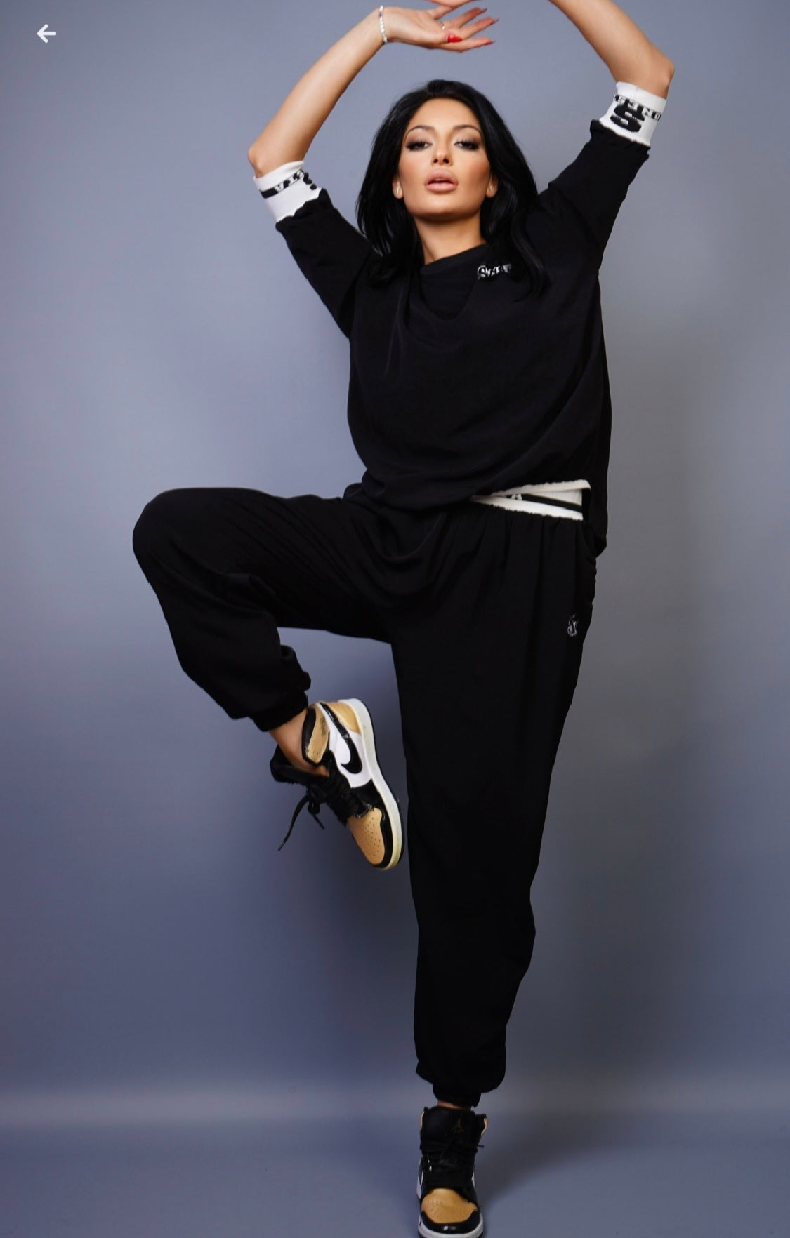 Trendy Black Tracksuit with White Accents