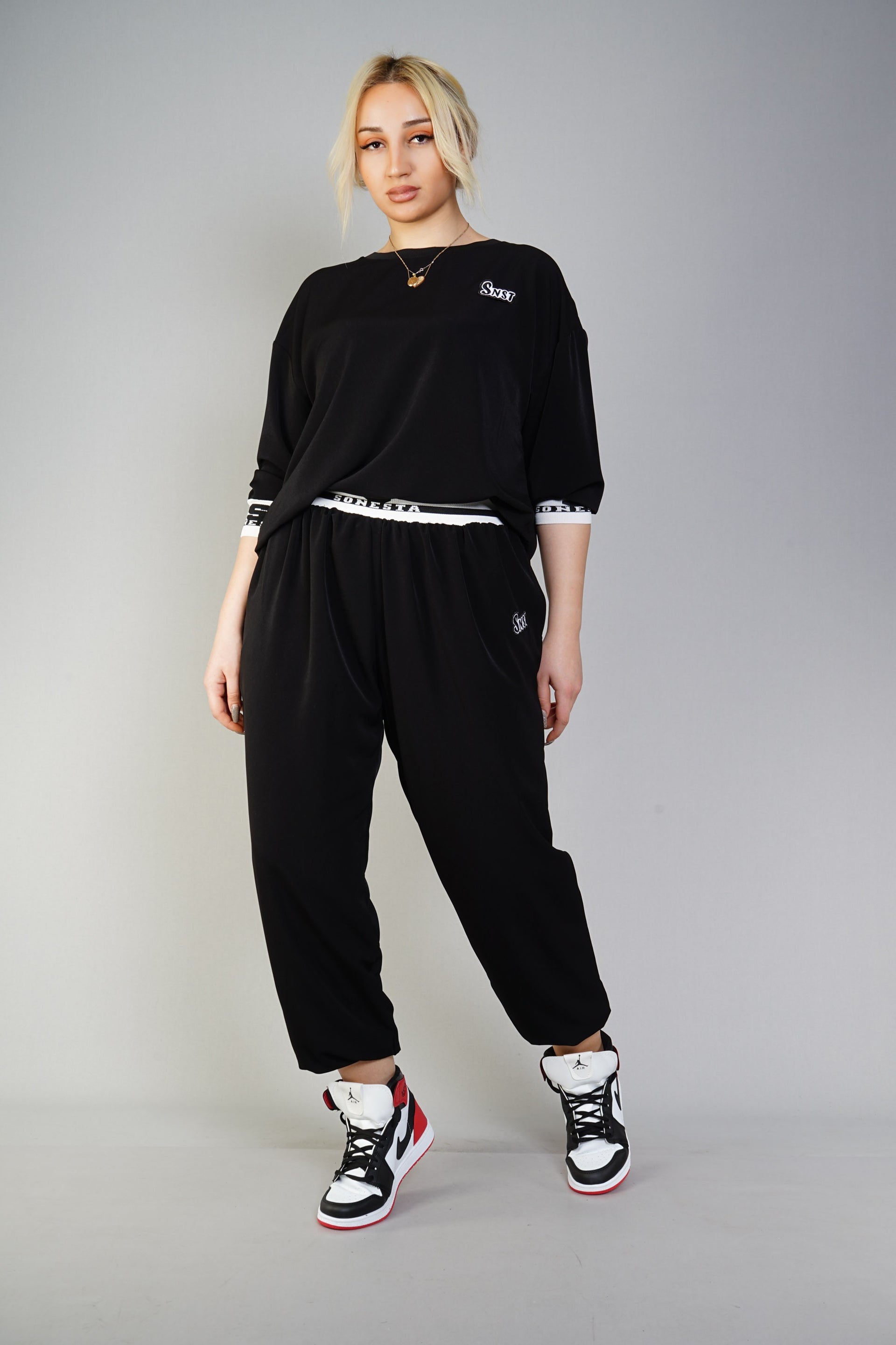 Trendy Black Tracksuit with White Accents